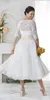 Vintage Lace Appliques Plus Size Bohemian Bröllopsklänningar med Sheer Half Sleeves V Necktea Längd En Line Beach Bridal Gowns