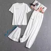 Mulheres Designers Roupas 2021 Tracksuits Mulheres Duas Peças Calças Conjunto de Roupas Carta Cor Sólida Cor Manga Curta Calças Terno Esportivo Homens de Algodão de Duas Peças