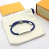 Bracciale regolabile alla moda in acciaio al titanio e cordino per gli amanti con confezione regalo disponibile SL0099684711