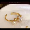 Armbanden juwelier de elegante oversize gesimuleerde parelmanchet armbanden voor vrouwen goud kleur metaal gelaagde holle onregelmatige charme bangle aessori