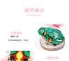 Manufacturers metal frog jumping frog clockwork children's baby toys classic 80 best selling toys wholesale stall