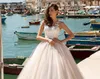 2021 Una línea Vestidos de novia Vestidos de novia Tallas grandes Sin mangas Ilusión Corpiño Botón cubierto Apliques de encaje Cuentas Vestios de Novia