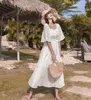 High-end Runway Dress Women Summer square collar Elegant Flare Sleeve White Hollow out Maxi Beach party Long Dress 210514