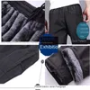 Men's Winter Warm Pants Thicken Sweatpants Men Plus Velvet Padded Trousers Slim Brand Large Size Solid Trend Sports Jogges L-6XL P0811