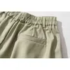 Vanlig kostymbyxor män elastiska midja bred ben öppning halv längd män shorts 210603