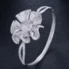ThreeGraces brillant CZ cristal pierre réglage dames couleur argent grande fleur en forme de manchette ouverte bracelets pour danse fête BA028 Bangle