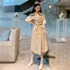 Gilet da donna stile coreano moda Trench coat doppio petto lungo con cintura Office Lady Giacca a vento Primavera Autunno Mantello Gilet