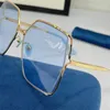 Nouveau design de mode femme lunettes de soleil 0817 métal plein cadre lentille irrégulière printemps jambe tendance et forme généreuse uv400 lunettes de protection