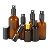 Partihandel Amber Glass Essential Oil Perfume Spray Flaskor med kvalitet Svart Fine Mist Atomizer Sprayer / Lotion Pump Top, 5ml-100ml