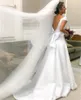 Vestidos de novia con lazo sin espalda sexy Una línea 2021 Apliques de encaje Coreano con cuello en V Satén Vestidos de novia largos Tren de la corte por encargo Robe De Mariage