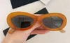 Pequeñas gafas de sol ovaladas blancas y grises para mujer Sonnenbrille gafa de sol Gafas de sol de moda Gafas de protección UV400 con estuche 284B