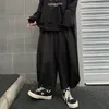 Herrbyxor Instudios Mode Ins Japanska Retro Loose Wide Leg Black Knickerbockers Capris för män och kvinnor