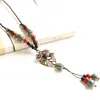 Pendant Necklaces Vintage Hollow Leaf Ceramic Watermelon Beads Long Tassel Pendants Necklace Flower Leaves Ethnic Wood Bead Charm Choker Jew