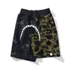 Shorts de plage pantalons de sport pour hommes femmes bain singe pantalons de survêtement été camouflage pantalon court mode lettre impression tête de requin lumineuse