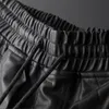 Pantalones de motociclista rasgados de estilo francés de alta calidad para hombre, pantalones ajustados de motociclista de cuero negro ajustado acanalado, talla de lápiz S-5XL para hombre