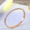Luxo duplo linha zircão pulseira oval titanium aço fivela mulheres rosa ouro casal casamento punho pulseira jóias presente bijoux q0717