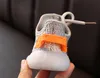 2024 Boy Sneakers Girl Baby Designer Flying Weaving Sports Loisker Houstable Coconut Luminal Running Chaussures Enfants