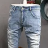 Koreanska stil mode män jeans retro ljusblå elastisk bomull rippad för streetwear vintage designer slim denim byxor nwss