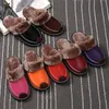 Designer schoenen heren pantoffels winter katoen fluwelen warme damesschoenen klassieke mode Koreaanse binnenhuis pantoffels damesliefhebbers schoenen heren lederen pantoffels zwart rood