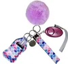 7 Renk Moda Savunma Anahtarları Set Pompom Alarm Keychain Ruj Tutucu ve Bileklik Kadın Erkekler Kendini Savunma Keyasyonu