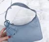 Wysokiej jakości luksusowe designerskie torby kosmetyczne skrzynki TOTE TOTE Nylon portfel mody skórzany słynny ramię torebki torebki torebki hobo crossbody