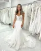 2021 Sexig Arabisk Dubai Mermaid Bröllopsklänningar Formella Bröllopklänningar Sweetheart Ärmlös Full Lace Appliques Tulle Avtagbar Tåg Overskirts Plus Storlek