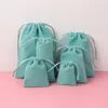 Sachets de bijoux, sacs 5pcs de haute qualité 8 couleurs de rangement de rangement perles / thé / bonbons / bijoux Organza Sac à cordon pour le mariage Gift PO de Noël PO