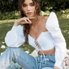 Femmes Sexy Hollow Out Lace Up Crop Top Solide Longue Lanterne Manches T-shirt Automne Dames Casual Chemise Streetwear 210604