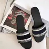 2021 Designer lederen vrouwen sandalen zomer platte slipper fashion beach vrouw grote hoofd regenboog letters slippers met doos