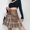 Mulheres saia moda mulheres pu retalhos de couro A-linha plissada mini saias para fêmea estilo estilo xadrez saias 210524