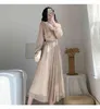 Mujeres primavera diseño elegante coreano elegante temperamento salvaje vestido femenino cuello en V manga linterna brillante una línea vestido 210514