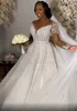 2021 Plus Storlek Arabiska Aso Ebi Lyxiga Mermaid Beaded Bröllopsklänningar Lace Sheer Neck Långärmade Avtagbara Tåg Bridal Klänningar ZJ554