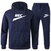 2023 Marca de moda Blue Tracksuit Men Manga Longa Capuz Sports Sports Definir blusas de pulôver e calças de corrida roupa casual