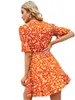 Strand Mini Print Ruffles Klänning Sommar Fresh och Sweet V-Neck Floral Bow Dress Women Butterfly Sleeve Party Vestidos 210508