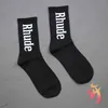 Chaussettes de rhude lettre simple de haute qualité coton européen américain de rue des chaussettes de tendance de rue hommes et femmes chaussettes à aiguille chaleureuse et confortable rhude couple intube so pwe0