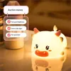 Luci notturne Simpatica lampada notturna in silicone Giocattolo per bambini Regalo di compleanno Anno del bue Creativo