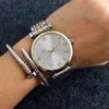 Relojes de marca superior para mujer, reloj de pulsera de cuarzo con banda de acero y Metal estilo cristal para mujer y niña AR09