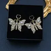 Brillant Papillon Cristal Charme Boucles D'oreilles Double Lettre Designer Goujons Coloré Diamant Bijoux En Gros