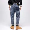 Estilo de rua moda homens jeans retro azul elástico largamente perna rasgada bordado designer hip hop casual denim calça