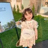 Tjejer sommar blommig spets puff ärm prinsessa klänningar koreansk stil baby flicka bomull förkläde broderi klänning 210615