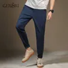 Gersri Nuovi modelli Pantaloni di qualità di fascia alta Jeans da uomo sottili Pantaloni casual quattro stagioni Tuta Nono pantaloni Pantaloni maschili taglie forti X0621