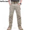 IX9 City Pantaloni cargo tattici da uomo Combattimento SWAT Pantaloni militari dell'esercito Cotone Molte tasche Pantaloni casual uomo elasticizzati flessibili XXXL 210714