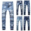 2020 Designer Ripped Jeans för män Slim Fit Ljusblå Denim Joggingbyxor Man Distressed Destroyed Byxor Knäppning Flugbyxor X0621