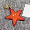 2021 venda na moda venda famosa marca de aço inoxidável jóias keychain para presentes besouro pássaro libélula starfish lo carimbo