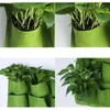 18/36/64 Pockets Green Grow Bags Planter Vertical Garden Vegetable Living Garden Bag Seedling Wall Hanging Planter Growing Bags 210615