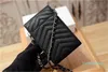 Projektant- Worki Damskie Posiadacze kart Posiadacze najwyższej jakości skórzane kobiety portfele czarne Organizuj torby slingowe Paski Torby do telefonów komórkowych HASP 17,5 cm