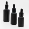 Wholesale 30ml 50ml 100mlの空の黒ガラスエッセンシャルオイルドロッパーボトル化粧品の梱包容器