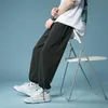 Летние штаны с широкоземным ногами Мужская мода черно-белые повседневные мужчины уличная одежда корейский свободные брюки прямые ноги брюки M-2XL
