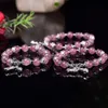 Genuine Natural Ice Strawberry Quartz Crystal 10mm Round Beads Strand Bracelet Clear Red Gemstone Beaded Bracelets with Tibetan Charms and Flower Spacer Bead