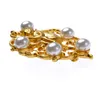 Boutique Amorita Singe doré Broches en perles simulées